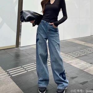 Low waisted chanel blue jeans, size L